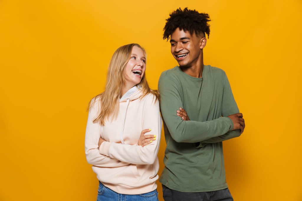 Teenagers Laughing with Braces